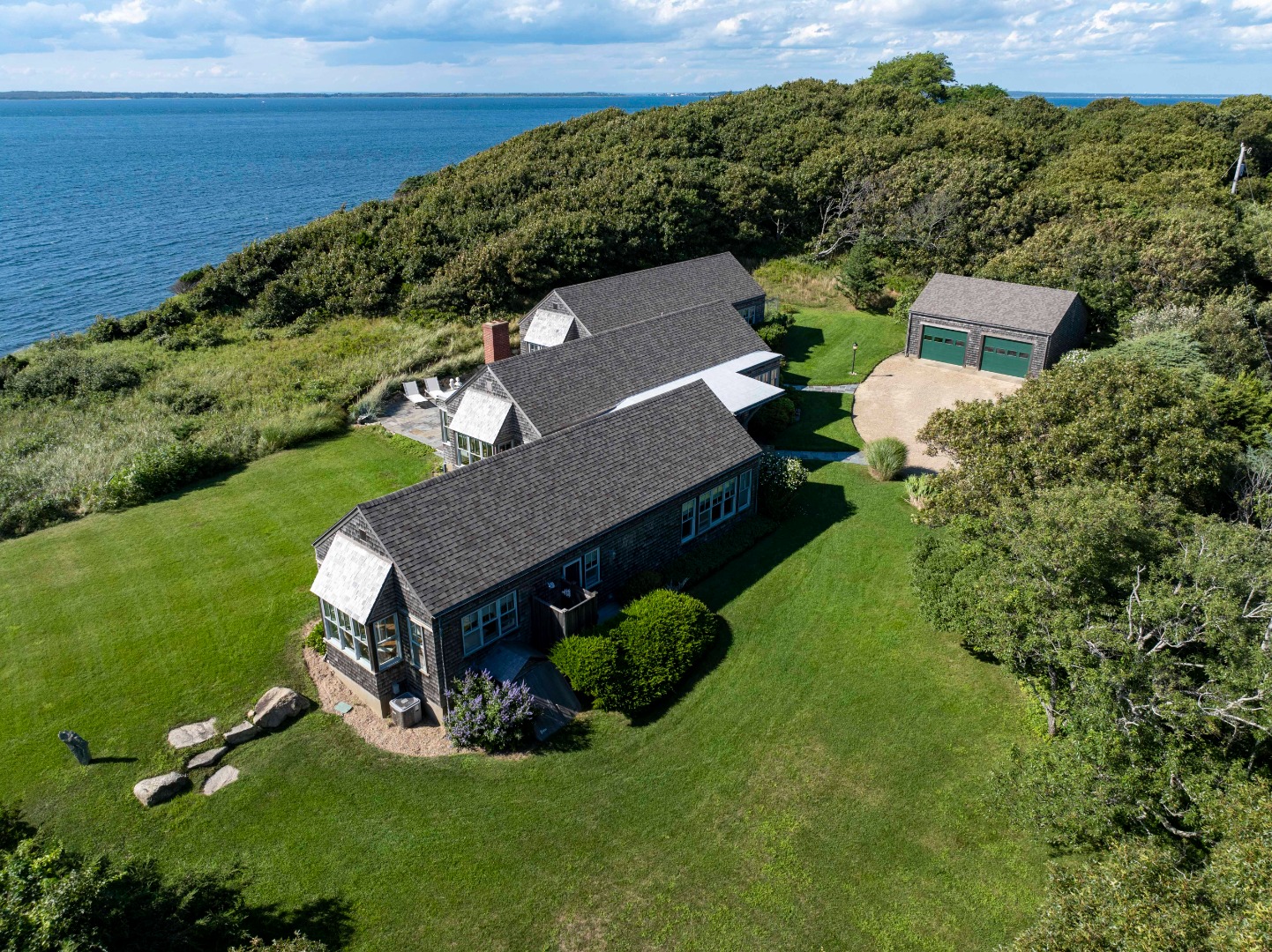 135 Capawock Road West Tisbury, MA 02568 - Photo 6 of 25 an aerial view of a house with a garden