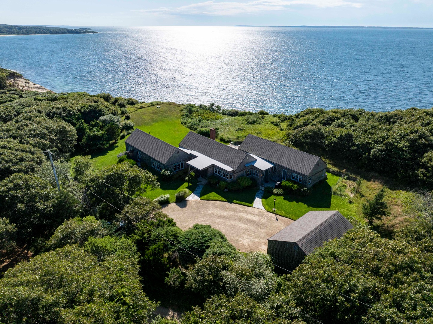 135 Capawock Road West Tisbury, MA 02568 - Photo 7 of 25 an aerial view of a house with a yard
