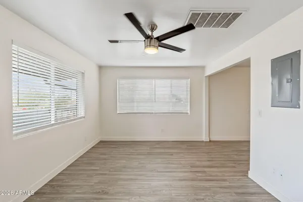 a view of balcony with wooden floor