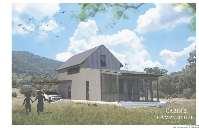 a view of house with backyard space and garden