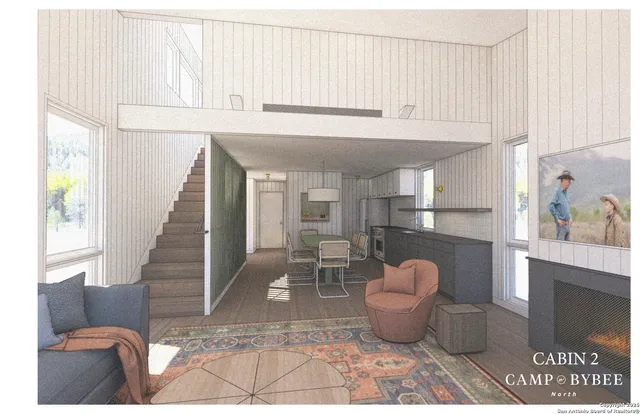 a room with furniture and a potted plant