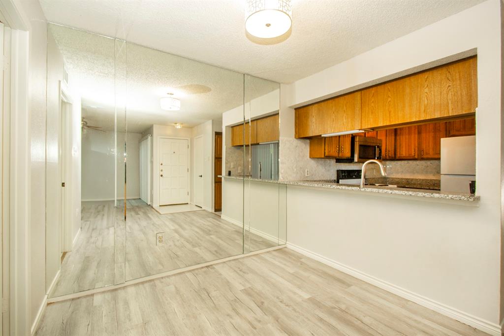 5626 Preston Oaks Road, Unit 9B Dallas, TX 75254 - Photo 3 of 20 a view of a indoor basketball space