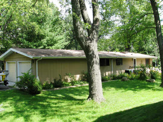 695 Lake Summerset Road Lake Summerset, IL 61019 - Photo 2 of 11 a front view of a house with garden