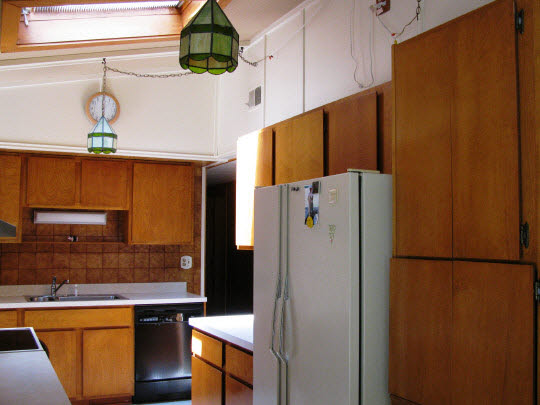 695 Lake Summerset Road Lake Summerset, IL 61019 - Photo 7 of 11 a white refrigerator freezer sitting in a kitchen
