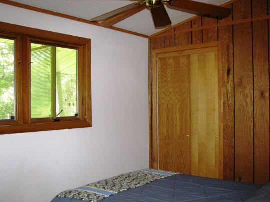 695 Lake Summerset Road Lake Summerset, IL 61019 - Photo 9 of 11 a view of an empty room with wooden floor and a window