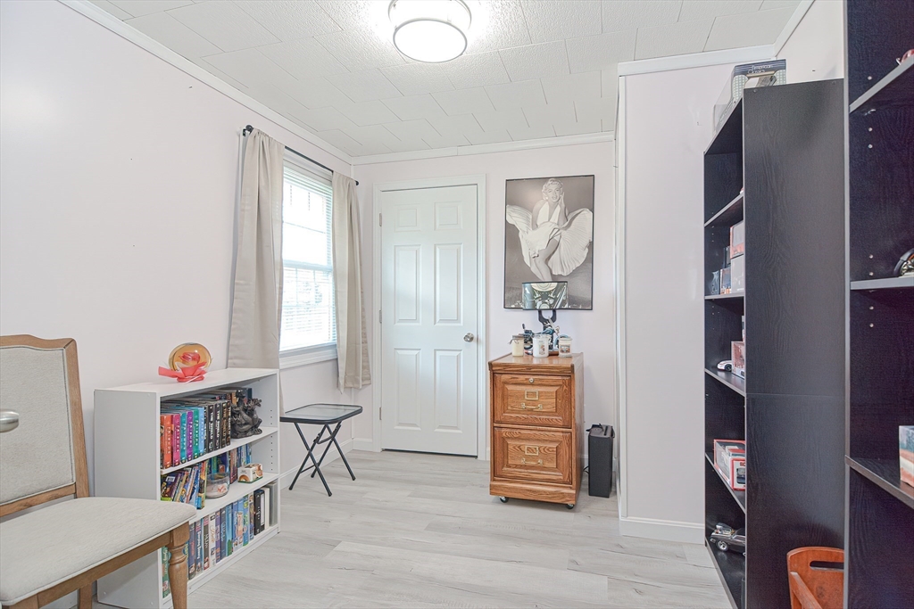 221 Smoke Rise Circle Swansea, MA 02777 - Photo 17 of 25 a view of a livingroom with furniture and windows