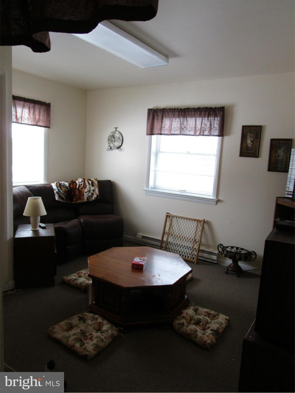 25331 Military Road Cascade, MD 21719 - Photo 9 of 13 a table room with furniture and a table