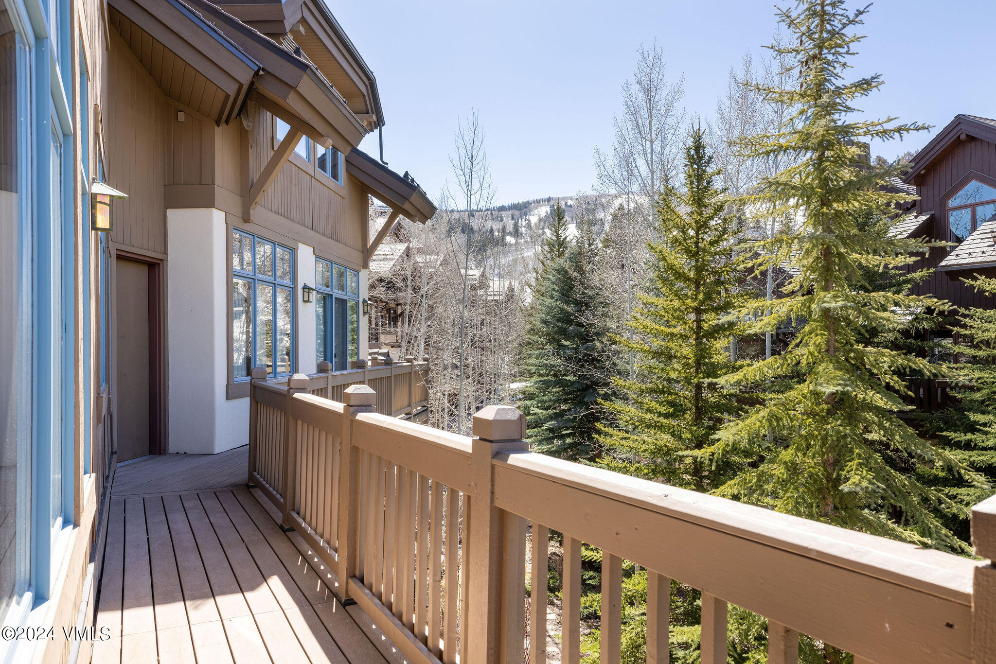 54 Cresta Road, Unit F6 Edwards, CO 81632 - Photo 11 of 13 a view of a balcony with wooden floor and fence