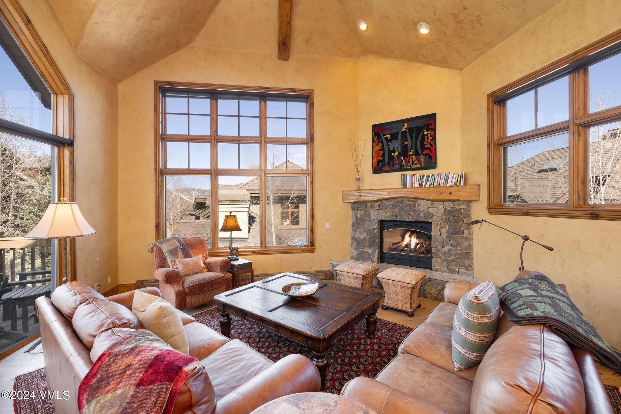 54 Cresta Road, Unit F6 Edwards, CO 81632 - Photo 2 of 13 a living room with furniture and a fireplace