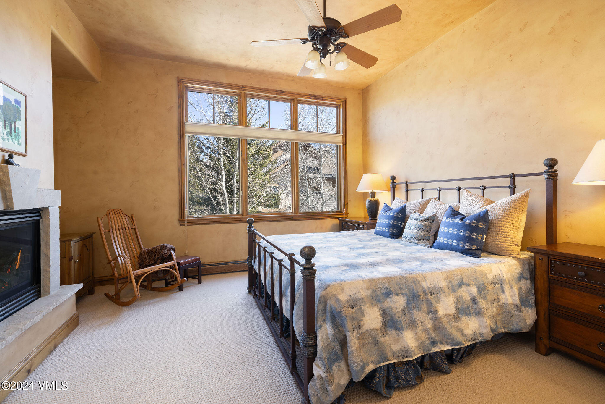 54 Cresta Road, Unit F6 Edwards, CO 81632 - Photo 6 of 13 a bedroom with a bed next to a window and a flat screen tv