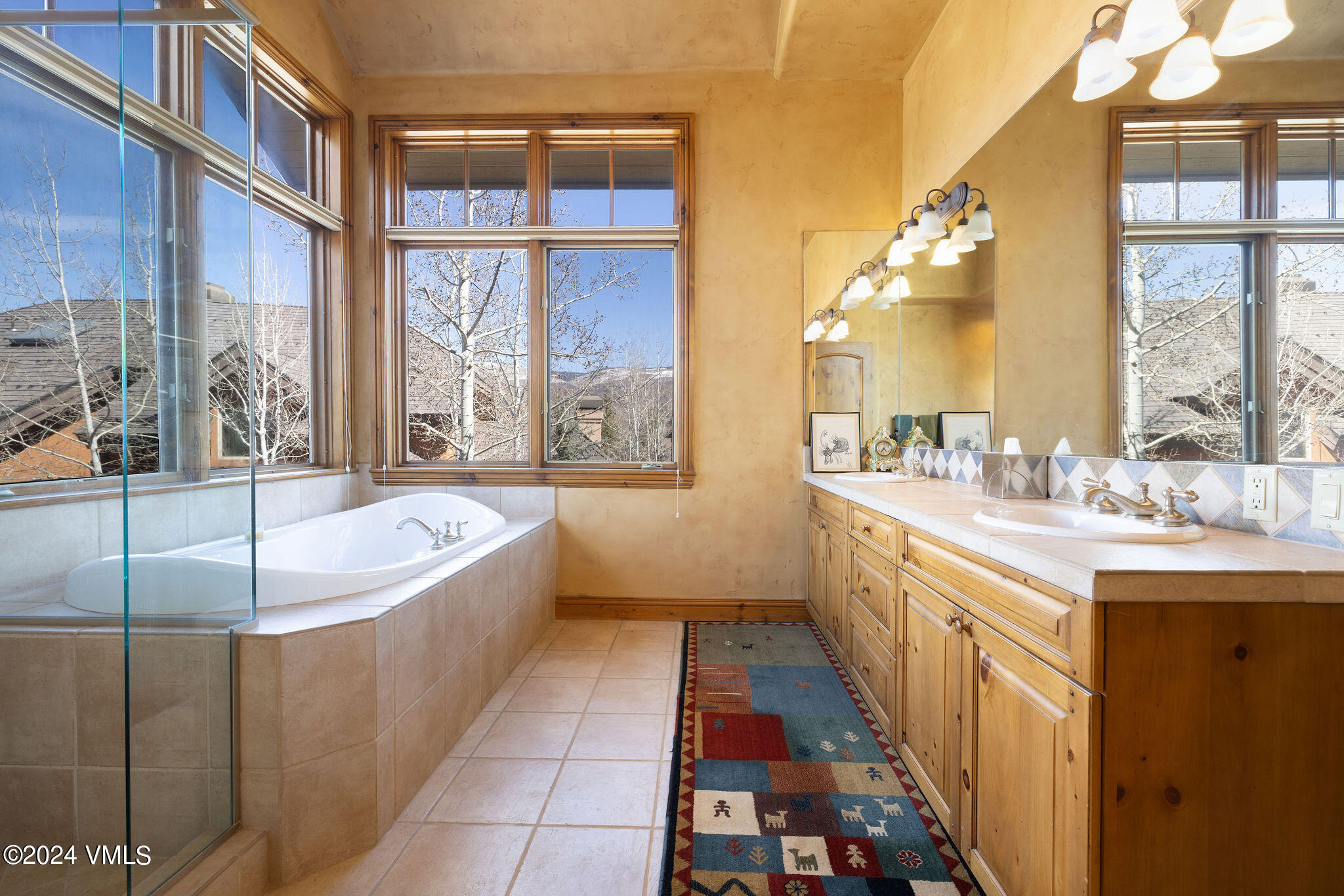 54 Cresta Road, Unit F6 Edwards, CO 81632 - Photo 7 of 13 a large bathroom with a large tub and sink