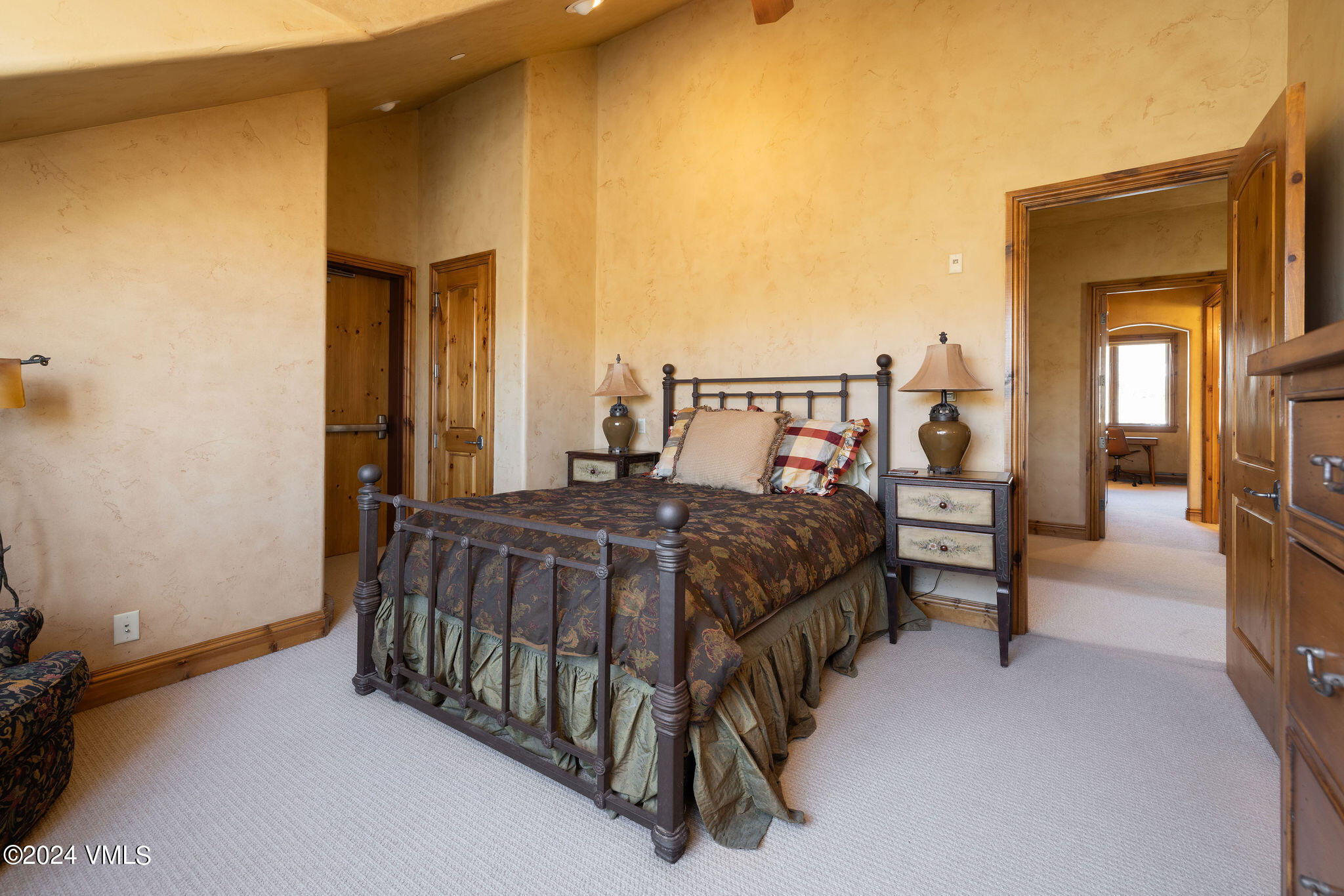 54 Cresta Road, Unit F6 Edwards, CO 81632 - Photo 8 of 13 a bed sitting in a bedroom next to a window