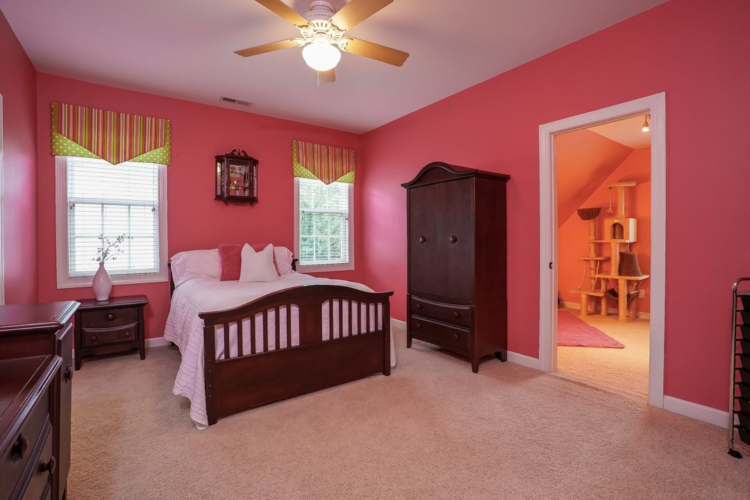 2920 Elmfield Street Raleigh, NC 27614 - Photo 23 of 30 The perfect room for your teen or tween! It features two windows, a ceiling fan, a walk-in closet and direct access to a full bathroom. The best part is the flex room off the bedroom! Bedroom 3