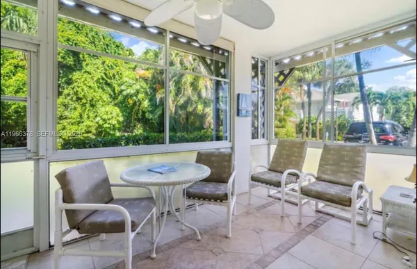 a outdoor living space with furniture and a potted plant