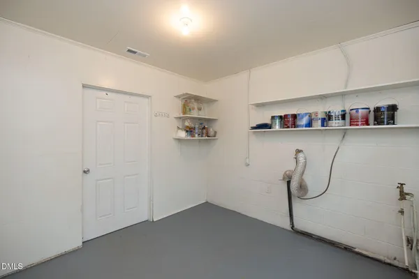 a view of small space with racks on the wall