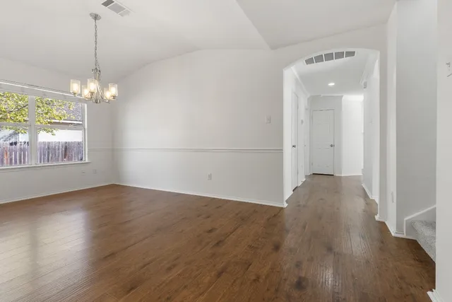 a view of livingroom with window and wooden floor