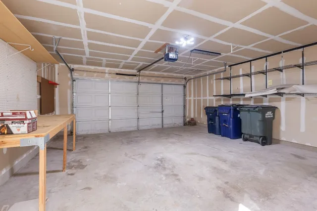 a view of a room with wooden ceiling