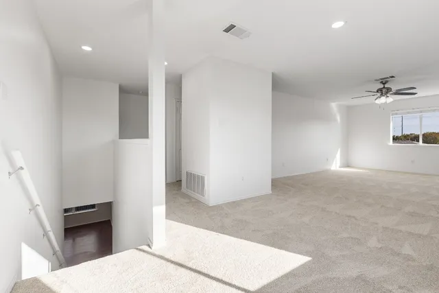 a white bath tub sitting in a bathroom