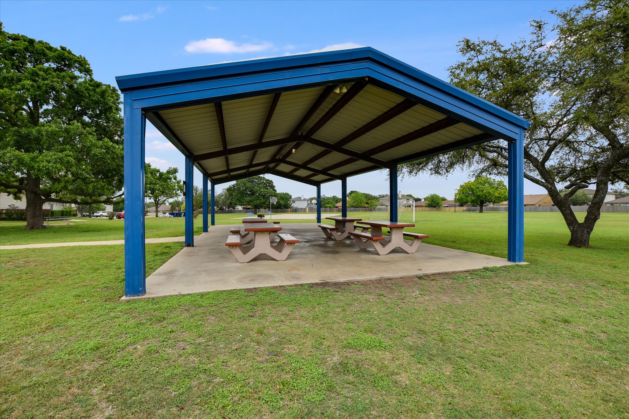 406 Golden Gate Drive Leander, TX 78641 - Photo 34 of 40 Surrounding community featuring a patio area and a lawn