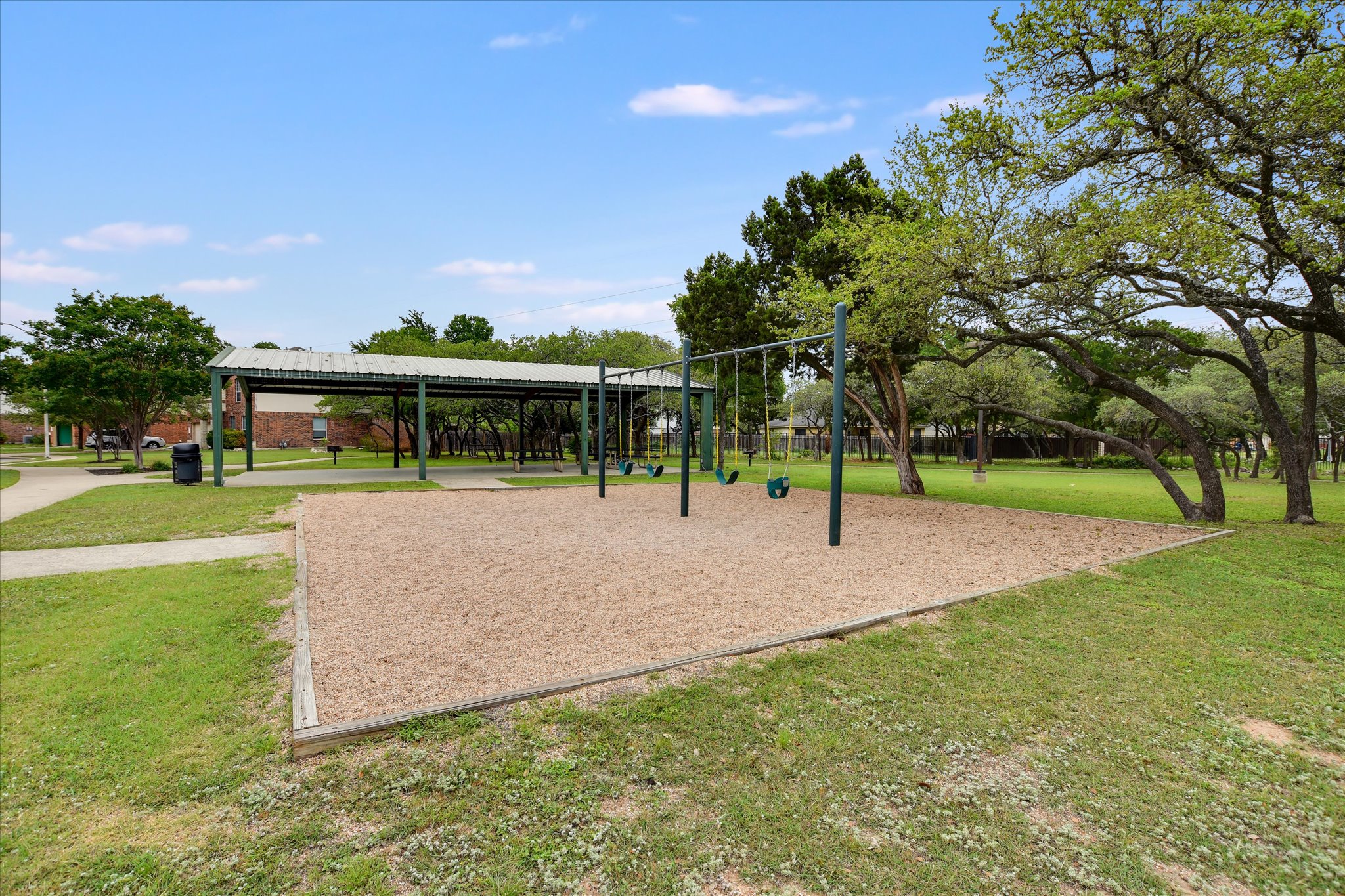 406 Golden Gate Drive Leander, TX 78641 - Photo 37 of 40 View of community featuring a lawn
