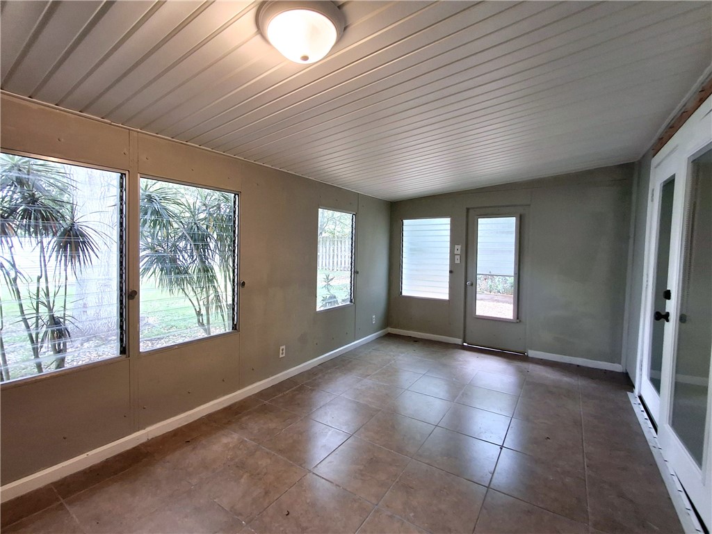 1110 10th Place Vero Beach, FL 32960 - Photo 16 of 18 a view of an empty room with a window