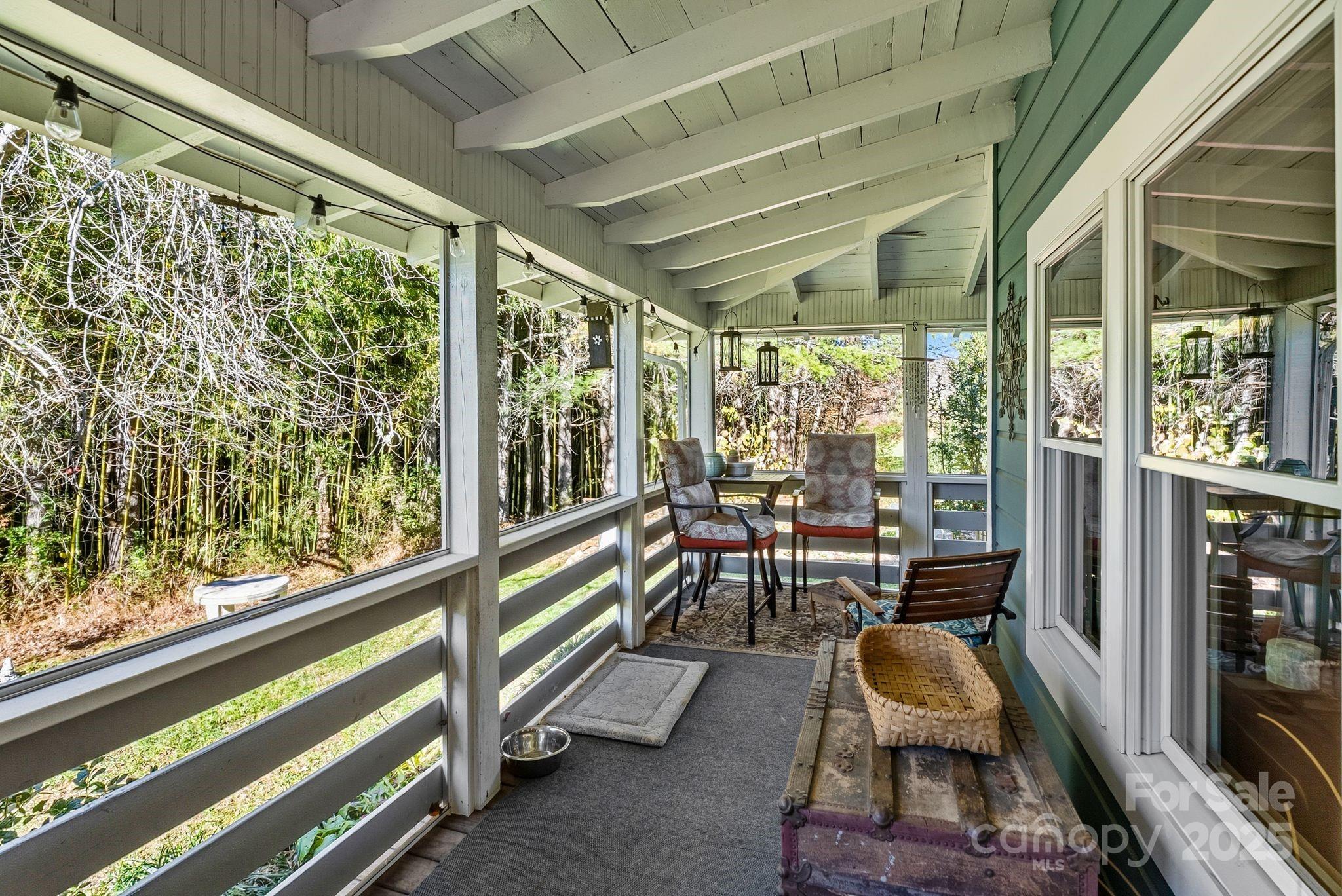 13 Holly Hill Farm Road Mars Hill, NC 28754 - Photo 22 of 44 a living room with furniture and a window