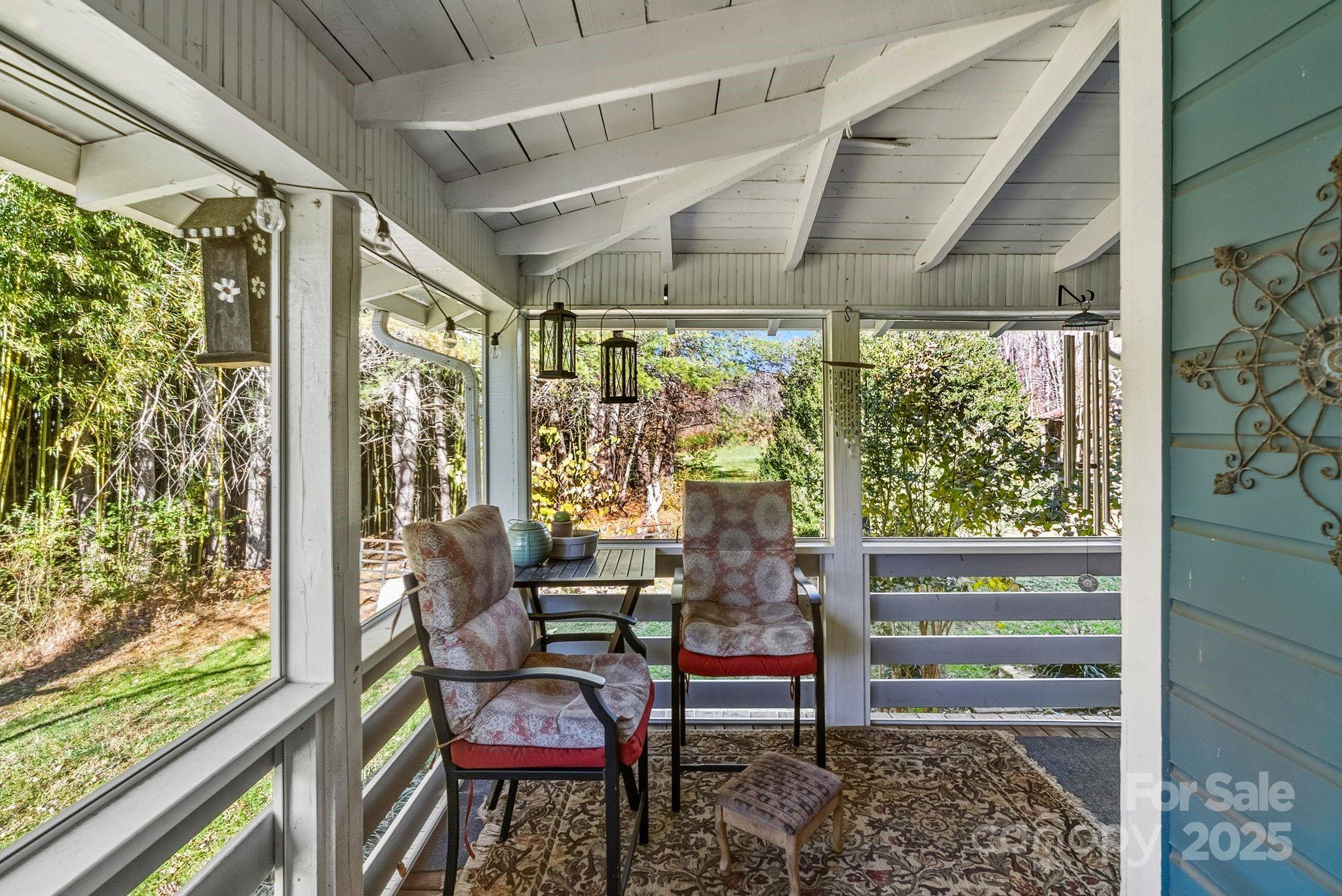 13 Holly Hill Farm Road Mars Hill, NC 28754 - Photo 23 of 44 a balcony with chairs and outdoor space