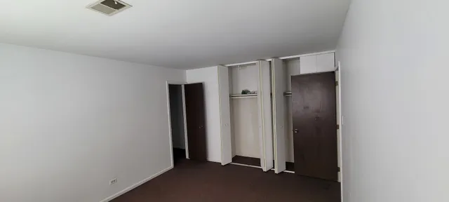 an empty room with closet