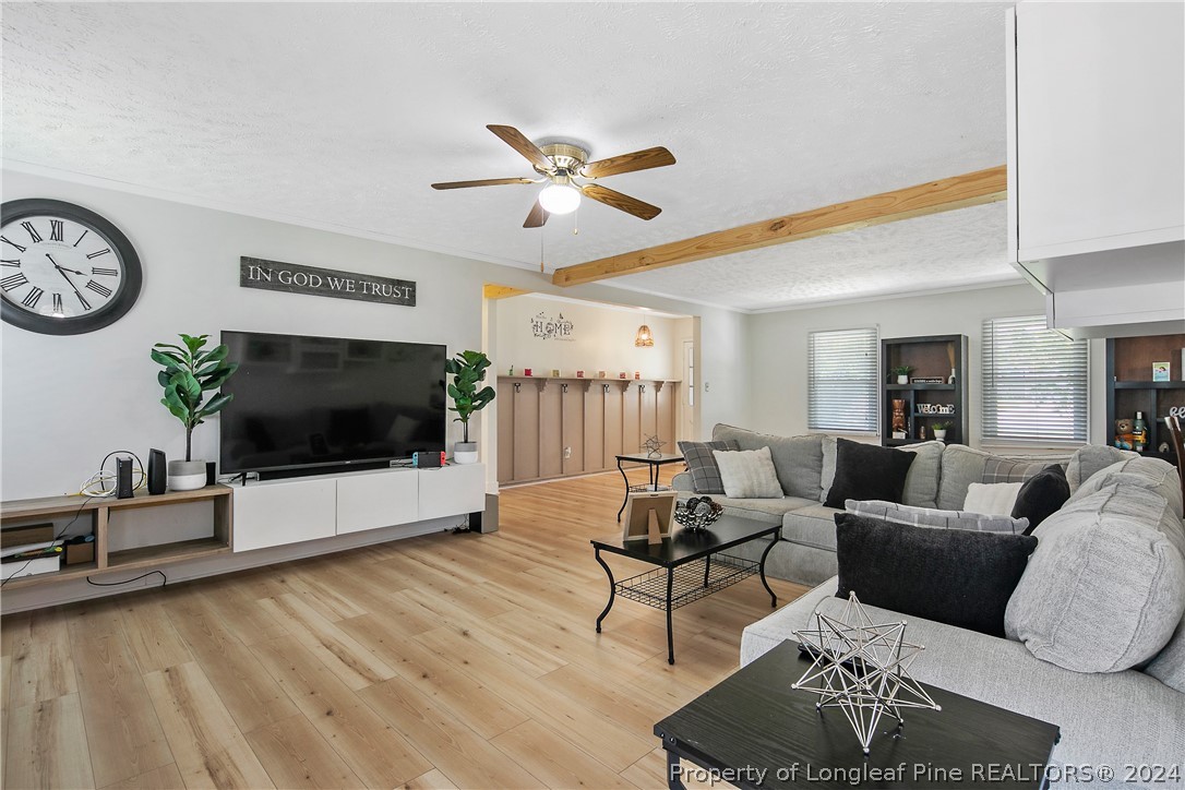 3011 Rouse Road Fayetteville, NC 28306 - Photo 14 of 50 a living room with furniture and a flat screen tv