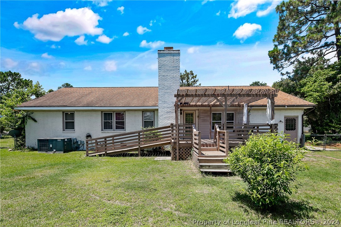 3011 Rouse Road Fayetteville, NC 28306 - Photo 46 of 50 a front view of a house with a garden