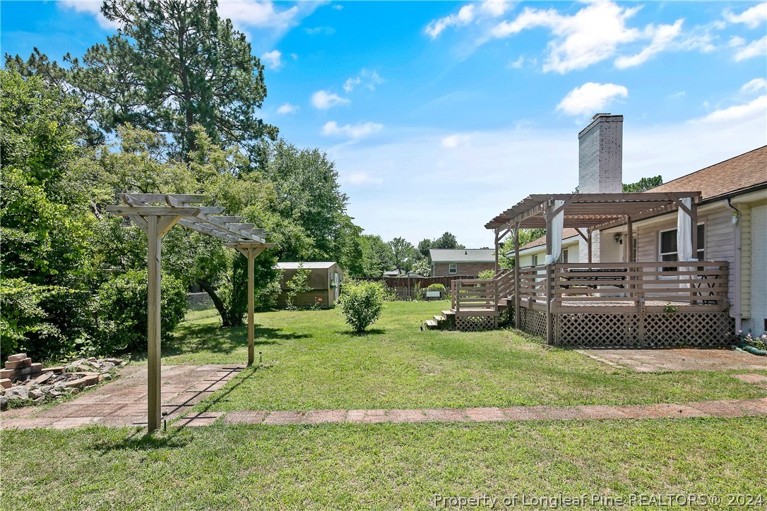 3011 Rouse Road Fayetteville, NC 28306 - Photo 49 of 50 a front view of a house with a yard