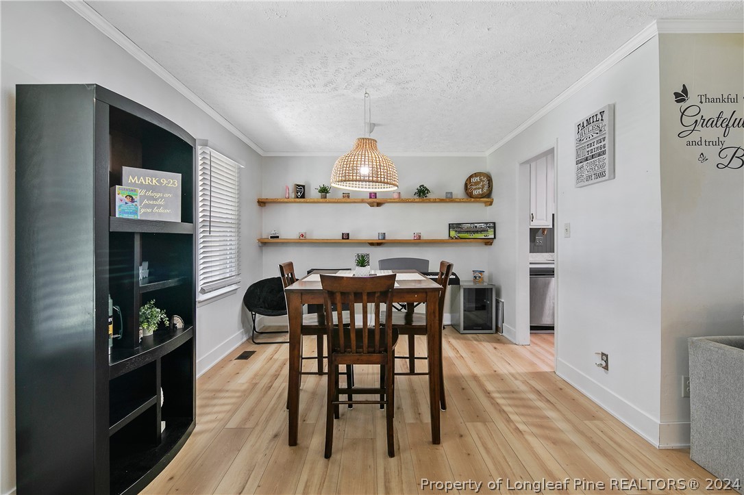 3011 Rouse Road Fayetteville, NC 28306 - Photo 10 of 50 a view of a dining room with furniture