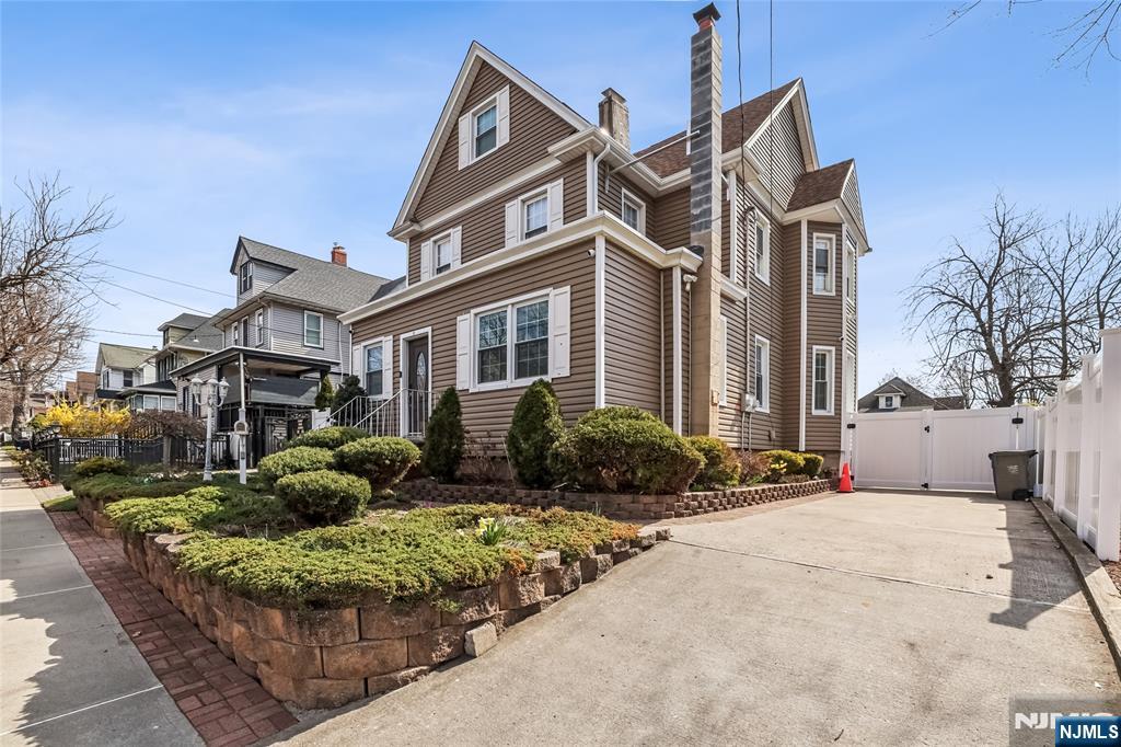 11 Garden Street, Unit 1 Ridgefield Park, NJ 07660 - Photo 1 of 20 a view of multiple house with a yard