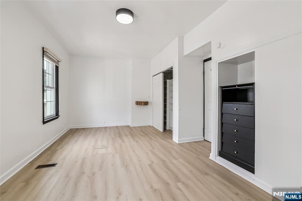 11 Garden Street, Unit 1 Ridgefield Park, NJ 07660 - Photo 14 of 20 wooden floor in an empty room