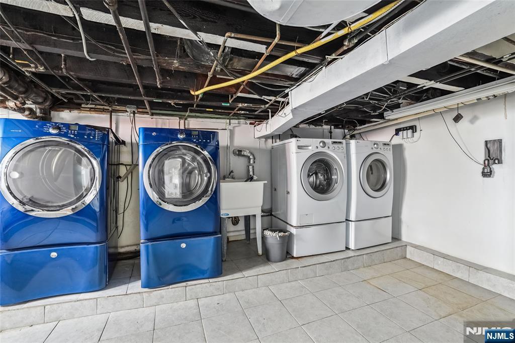 11 Garden Street, Unit 1 Ridgefield Park, NJ 07660 - Photo 19 of 20 a utility room with dryer and washer