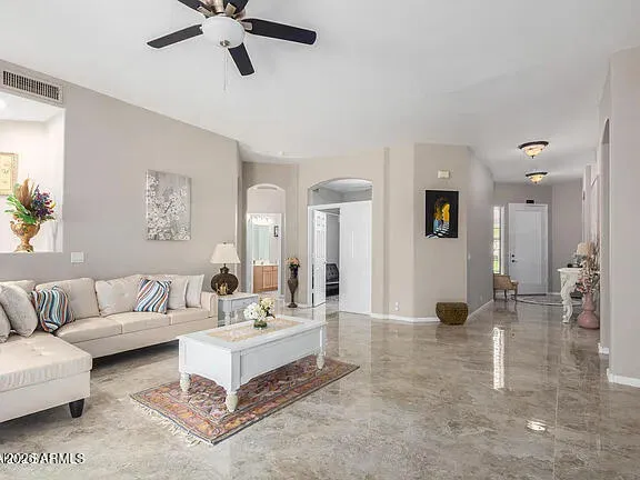 a living room with furniture and a view of living room