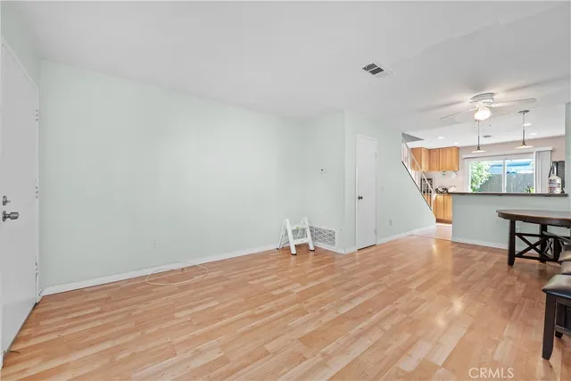 a room with a bed and a chandelier