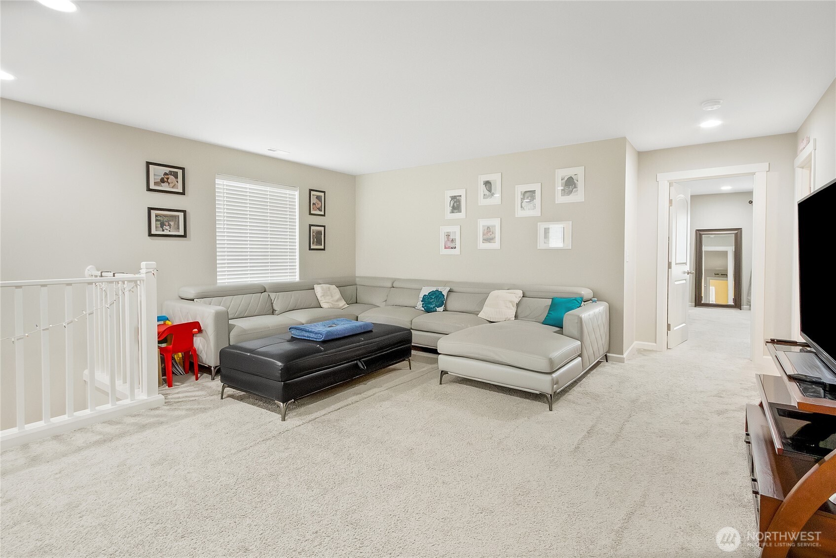 5014 Kenrick Street Southeast Lacey, WA 98503 - Photo 12 of 22 a living room with furniture and a couch