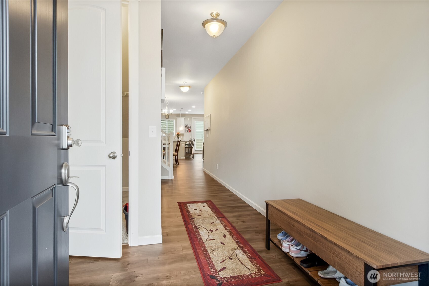 5014 Kenrick Street Southeast Lacey, WA 98503 - Photo 3 of 22 a hallway with wooden floor