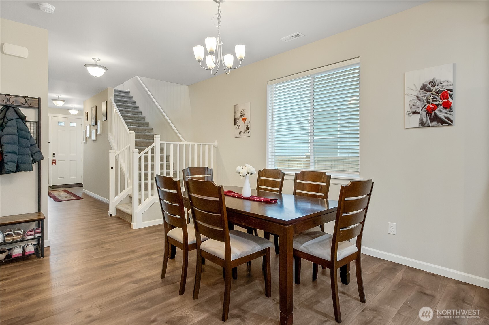 5014 Kenrick Street Southeast Lacey, WA 98503 - Photo 5 of 22 a view of a dining room with furniture and wooden floor