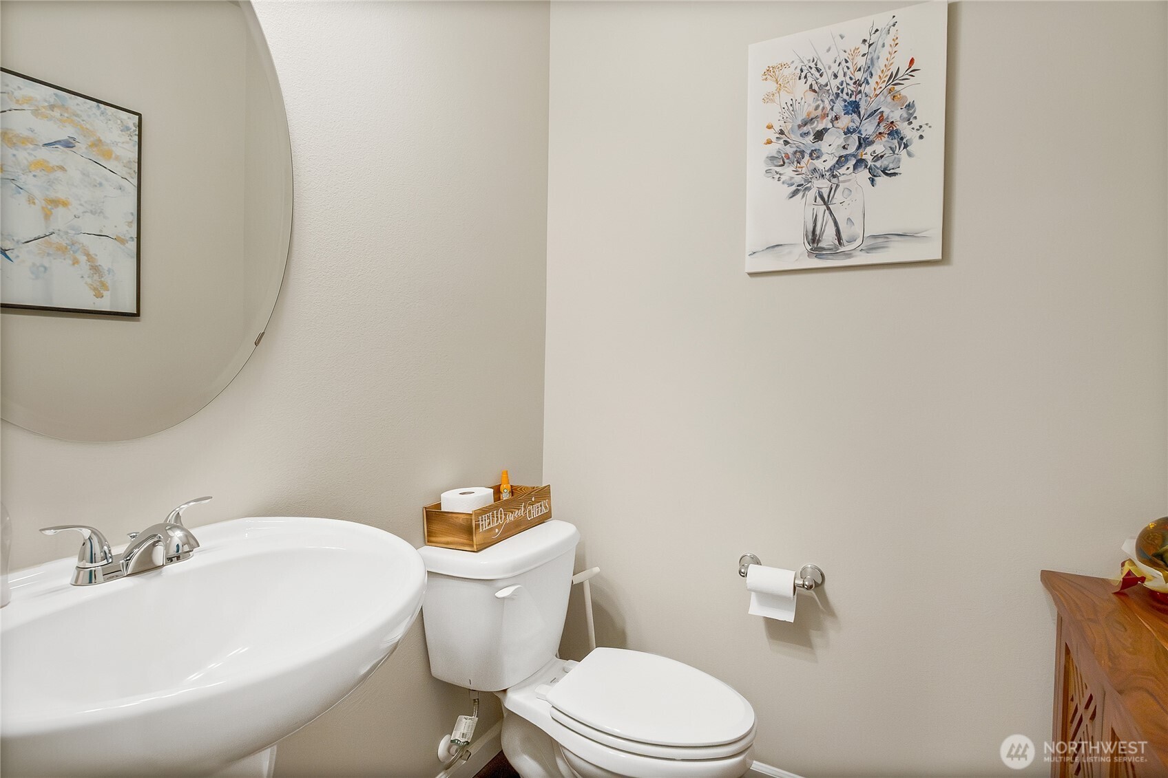 5014 Kenrick Street Southeast Lacey, WA 98503 - Photo 9 of 22 a white toilet sitting next to a bathroom sink