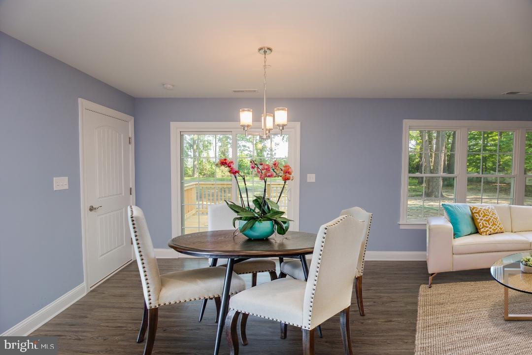 153 Fooks Road Bishopville, MD 21813 - Photo 29 of 30 a view of a dining room with furniture window and outside view
