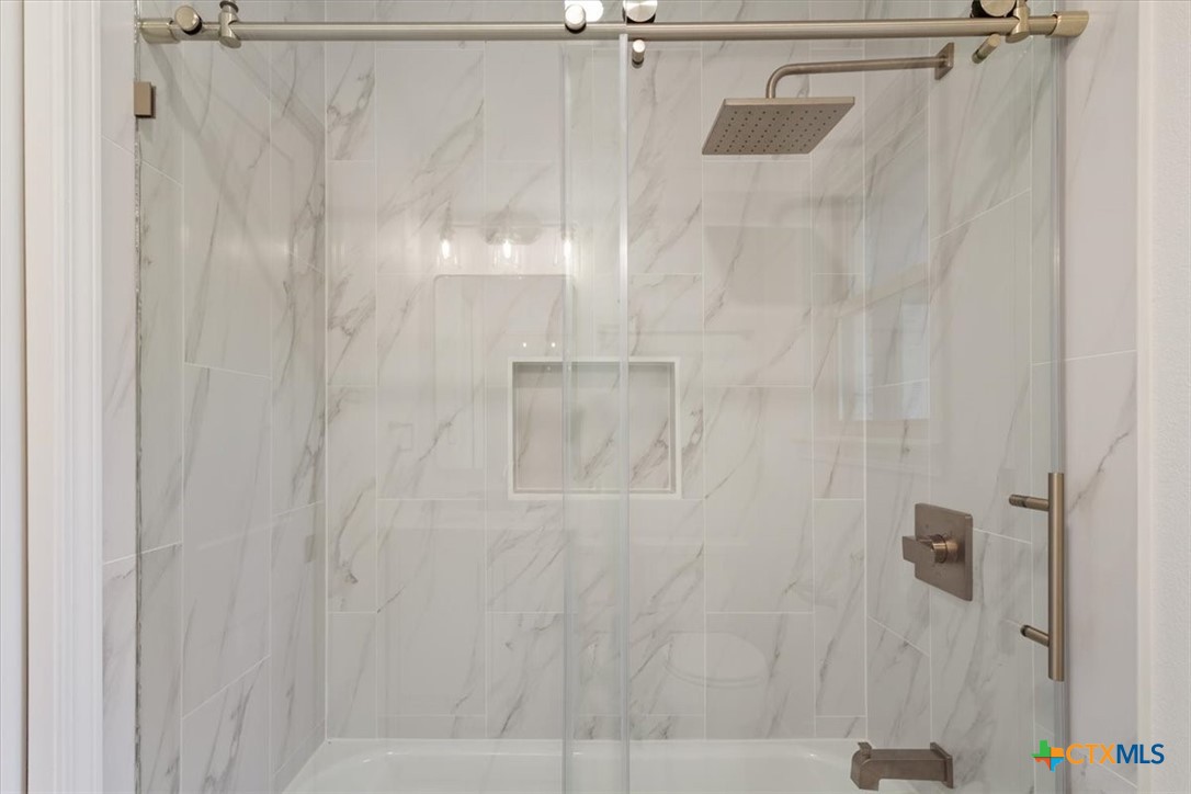 4412 Briar Cliff Road Temple, TX 76502 - Photo 20 of 28 a bathroom with a shower