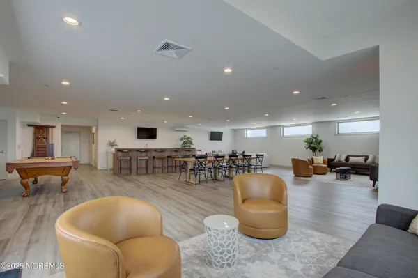 a workspace with furniture and wooden floor