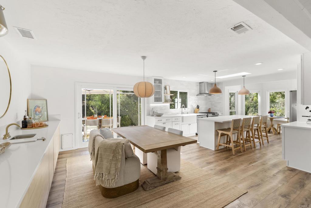 1427 Avocado Road Oceanside, CA 92054 - Photo 16 of 57 a living room with furniture and a large window
