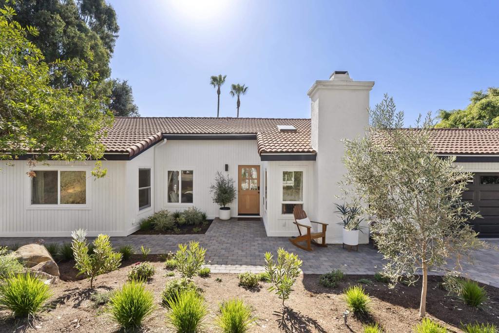 1427 Avocado Road Oceanside, CA 92054 - Photo 2 of 57 a front view of a house with a yard