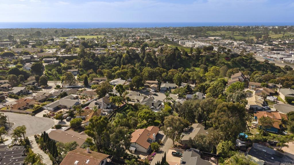1427 Avocado Road Oceanside, CA 92054 - Photo 56 of 57 an aerial view of residential houses with city view