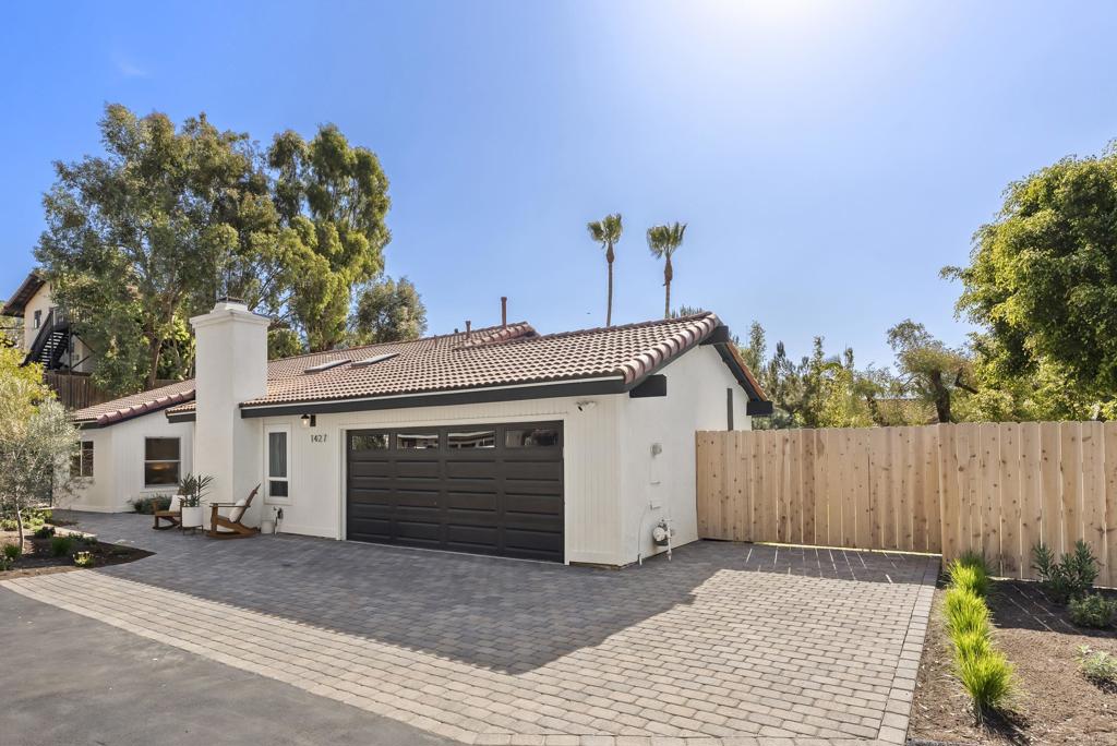 1427 Avocado Road Oceanside, CA 92054 - Photo 6 of 57 a view of a house with a garage