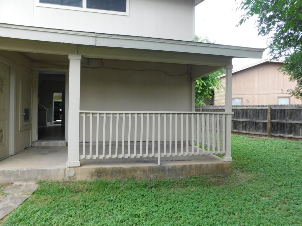 8208 Hood Circle, Unit A Austin, TX 78745 - Photo 12 of 14 a view of a house with a yard