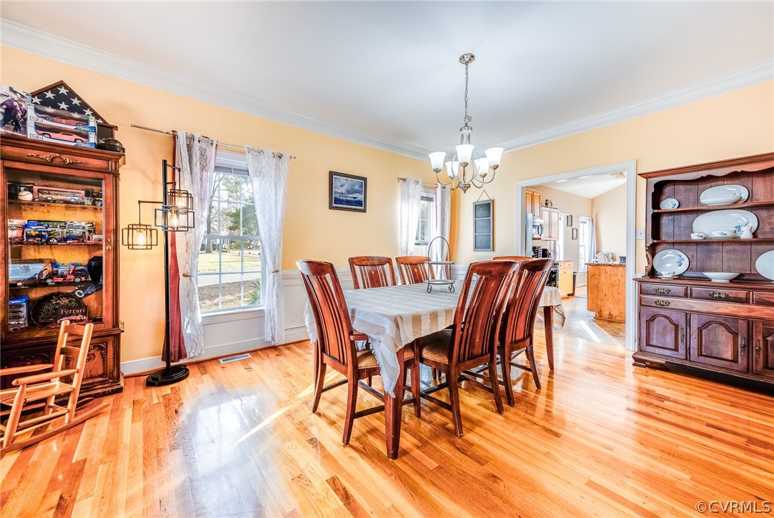12124 Club Ridge Drive Chester, VA 23836 - Photo 14 of 40 This dinning area can hold 12+ seated table. We removed the table extensions and extra chairs